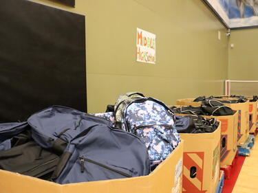 Bins full of Backpacks