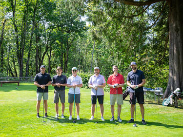 Program coordinator posts with Bateman Alum